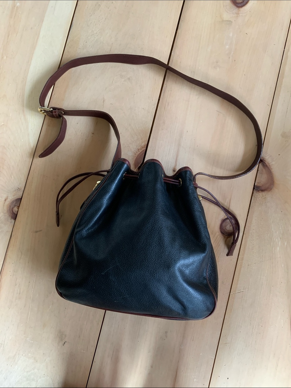 Vintage Black Leather Drawstring Crossbody Bag with Brown Trim
